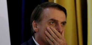 Multan a Bolsonaro y a su hijo por no usar mascarillas en Sao Paulo